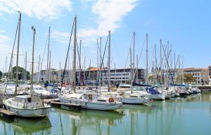 a bunch of boats docked in a harbor at Port de plaisance in Rochefort