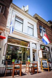 Een restaurant of ander eetgelegenheid bij De Vliegende Vos het geboortehuis van Johannes Vermeer