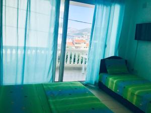 Postel nebo postele na pokoji v ubytování DK Apartmani
