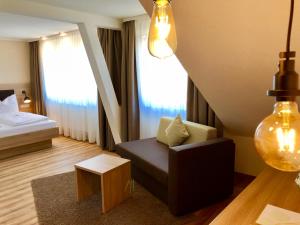 Postel nebo postele na pokoji v ubytování Flair Hotel Grüner Baum