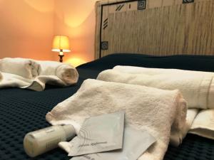 Ένα ή περισσότερα κρεβάτια σε δωμάτιο στο Giardino - Poggio del Casale - Affittacamere - landlords