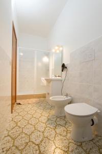 Koupelna v ubytování Le Maschere B&B