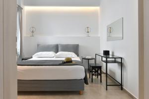 Posteľ alebo postele v izbe v ubytovaní Harmony Apartments