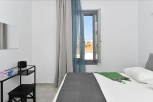 Posteľ alebo postele v izbe v ubytovaní Harmony Apartments