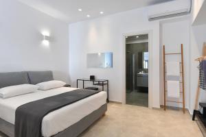 Posteľ alebo postele v izbe v ubytovaní Harmony Apartments