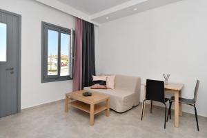 Posedenie v ubytovaní Harmony Apartments