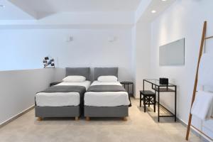 Posteľ alebo postele v izbe v ubytovaní Harmony Apartments