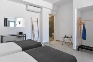 Posteľ alebo postele v izbe v ubytovaní Harmony Apartments