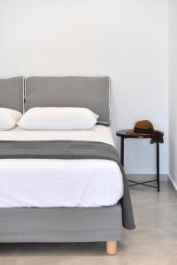 Posteľ alebo postele v izbe v ubytovaní Harmony Apartments