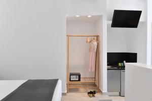 Televízia a/alebo spoločenská miestnosť v ubytovaní Harmony Apartments