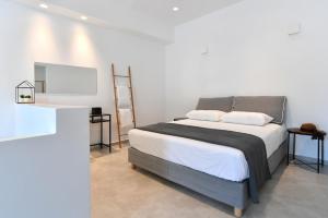 Posteľ alebo postele v izbe v ubytovaní Harmony Apartments