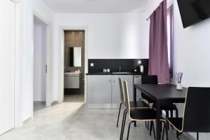 Kuchyňa alebo kuchynka v ubytovaní Harmony Apartments