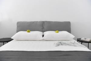 Posteľ alebo postele v izbe v ubytovaní Harmony Apartments