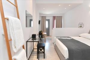 Posteľ alebo postele v izbe v ubytovaní Harmony Apartments