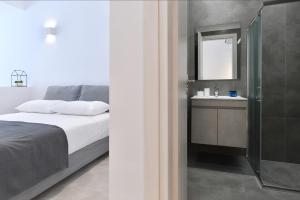 Posteľ alebo postele v izbe v ubytovaní Harmony Apartments