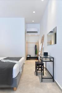 Posteľ alebo postele v izbe v ubytovaní Harmony Apartments