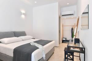 Posteľ alebo postele v izbe v ubytovaní Harmony Apartments