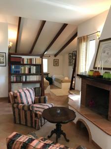 a living room with a couch and a fireplace at La casa di Sergio in Brindisi