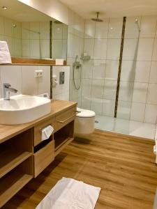 Koupelna v ubytování Flair Hotel Grüner Baum