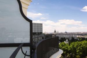 a view of the city from the balcony of a building at Riu Plaza España in Madrid