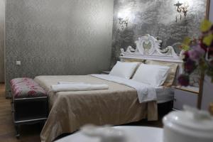 Katil atau katil-katil dalam bilik di Borjomi Classic Hotel