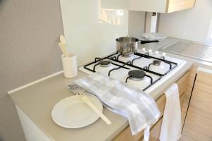 A kitchen or kitchenette at Tres Estrellas Costa Brava