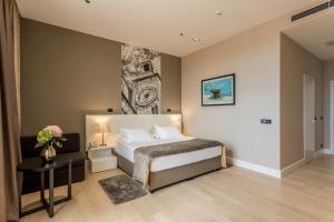Krevet ili kreveti u jedinici u okviru objekta Cornaro Hotel