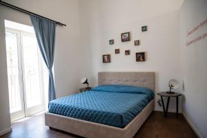 Posteľ alebo postele v izbe v ubytovaní A casa di Cassi