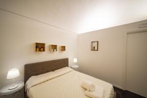 Posteľ alebo postele v izbe v ubytovaní A casa di Cassi