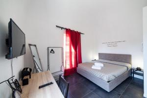 Posteľ alebo postele v izbe v ubytovaní A casa di Cassi