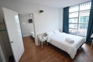 Postel nebo postele na pokoji v ubytování Vrest Hotel