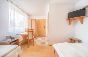 Postel nebo postele na pokoji v ubytování Donata