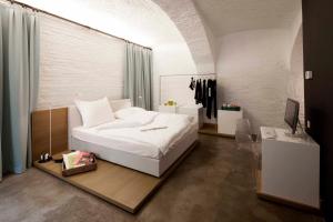 grätzlhotel beim Belvedere客房内的一张或多张床位
