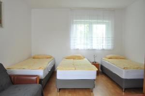 Postel nebo postele na pokoji v ubytování Dom Gościnny Soluch