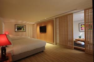 Cama ou camas em um quarto em Water House