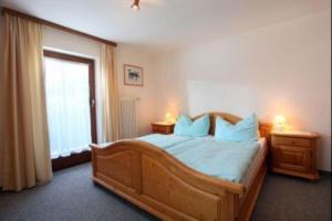Postel nebo postele na pokoji v ubytování Haus Sonnheim + 18 fotografií