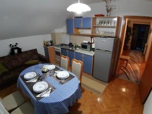 Kuchyňa alebo kuchynka v ubytovaní House Osana