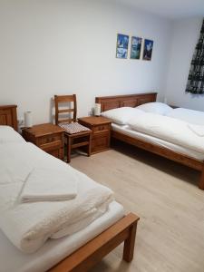 Posteľ alebo postele v izbe v ubytovaní Amalia Haus