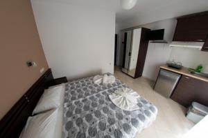 Postel nebo postele na pokoji v ubytování Klepsidra rooms