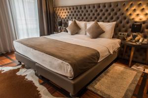 Postel nebo postele na pokoji v ubytování Solun Hotel & SPA
