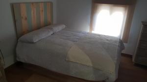 Postel nebo postele na pokoji v ubytování Casa Miguel