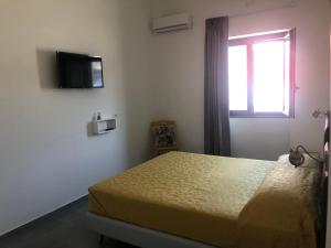 Katil atau katil-katil dalam bilik di Il Platano Residenza Rurale