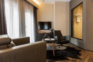 TV a/nebo společenská místnost v ubytování Solun Hotel & SPA