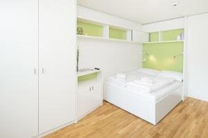 Krevet ili kreveti u jedinici u okviru objekta myNext - Hotel Leo