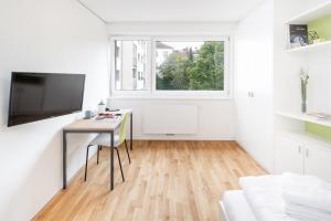 TV i/ili multimedijalni sistem u objektu myNext - Hotel Leo