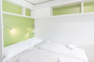 Krevet ili kreveti u jedinici u okviru objekta myNext - Hotel Leo