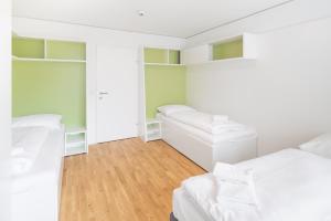 Krevet ili kreveti u jedinici u okviru objekta myNext - Hotel Leo
