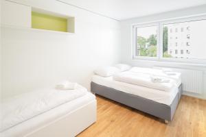 Krevet ili kreveti u jedinici u okviru objekta myNext - Hotel Leo