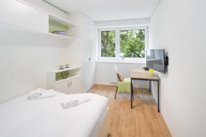Krevet ili kreveti u jedinici u okviru objekta myNext - Hotel Leo