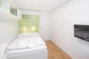 Krevet ili kreveti u jedinici u okviru objekta myNext - Hotel Leo